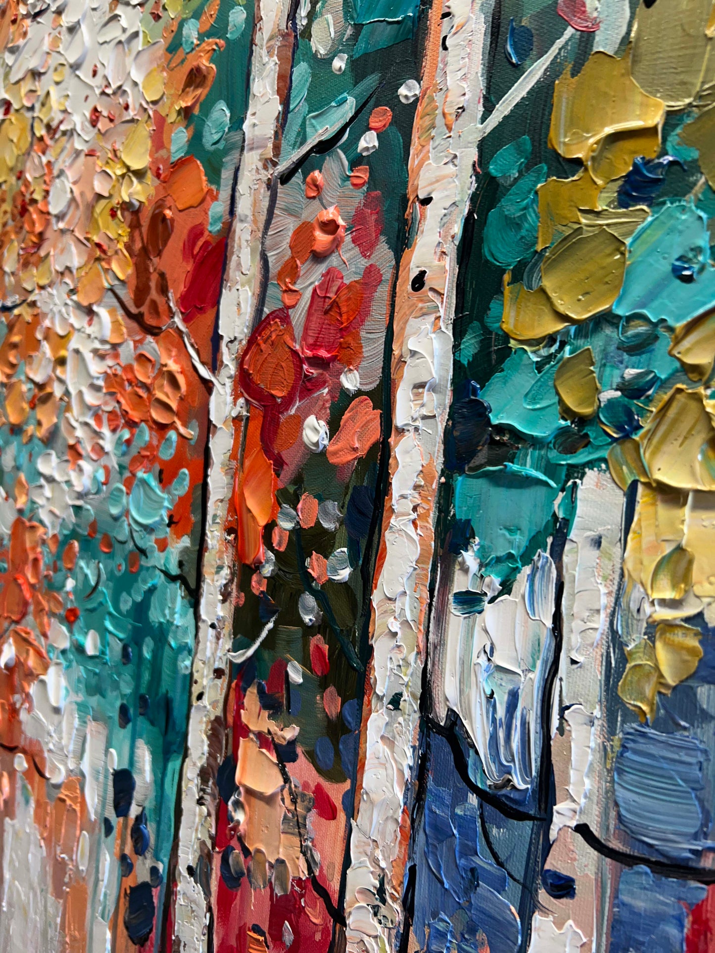 a close up of a painting of trees