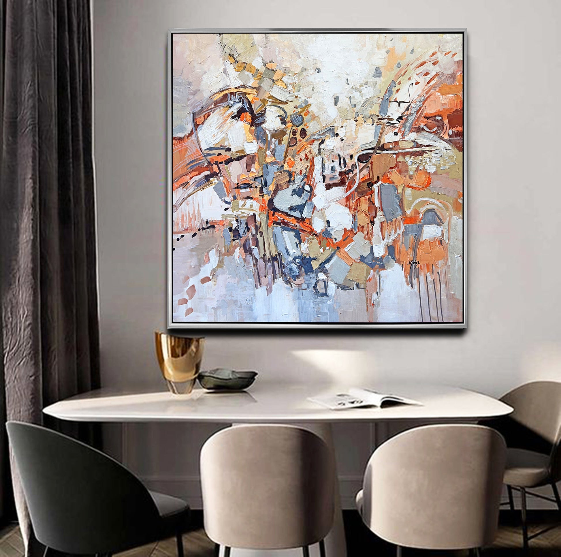 a painting hanging on a wall above a dining room table