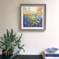 a painting hanging on a wall next to a potted plant