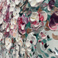 a wall with a bunch of flowers on it