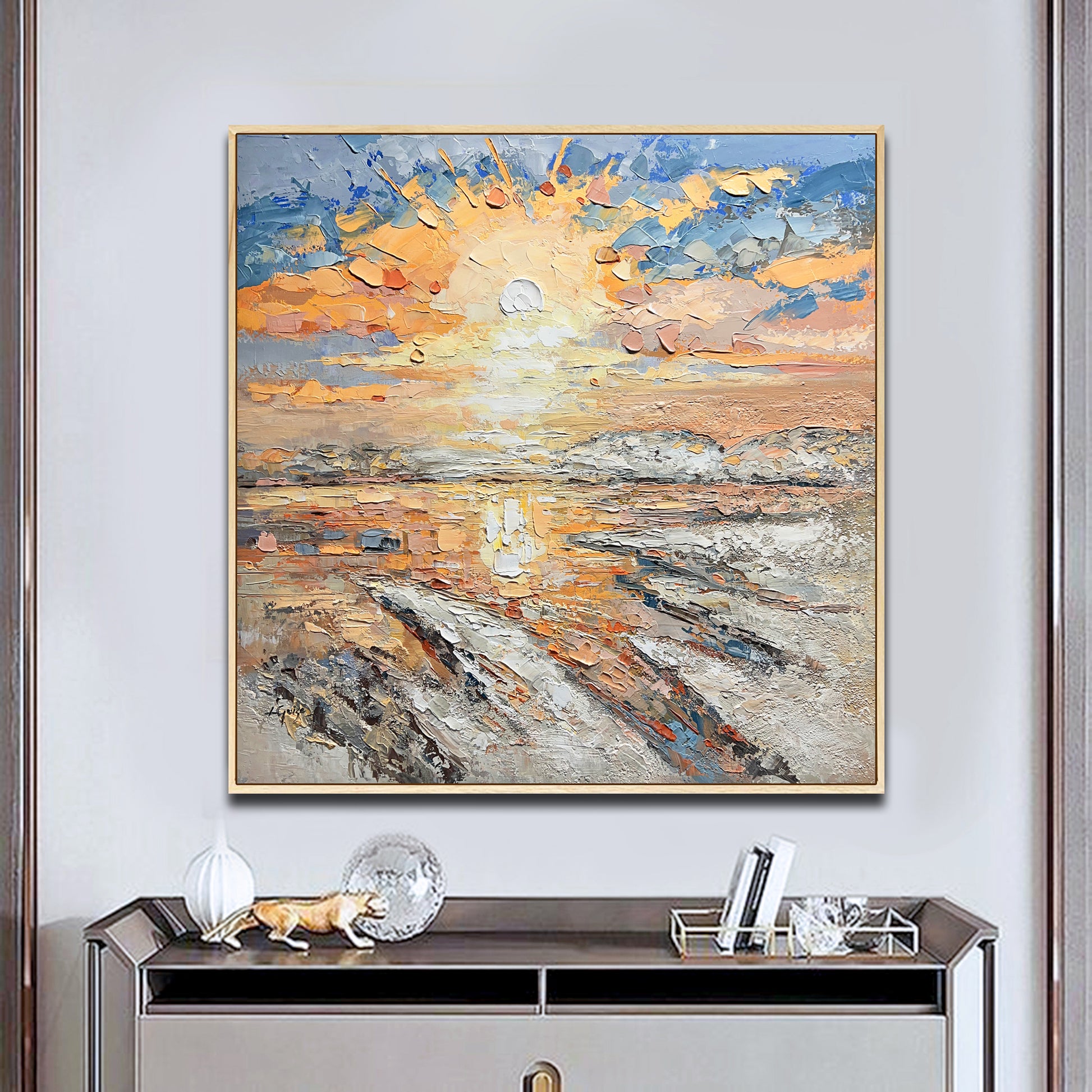 a painting hanging on a wall above a dresser