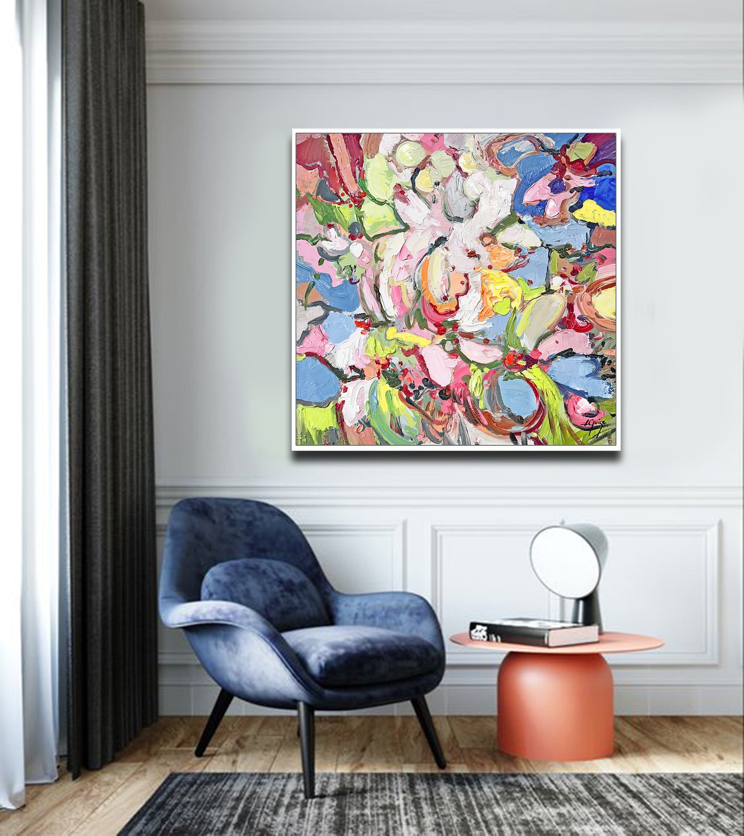 a living room with a blue chair and a painting on the wall