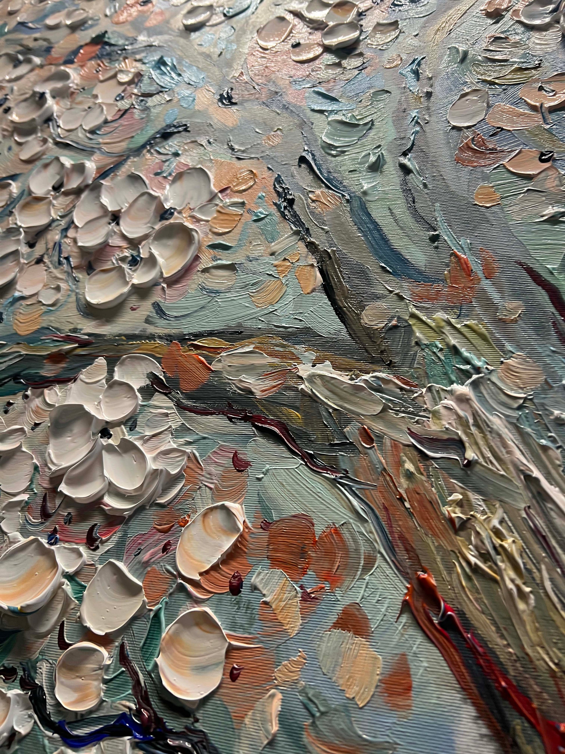 a close up of a painting with lots of paint on it