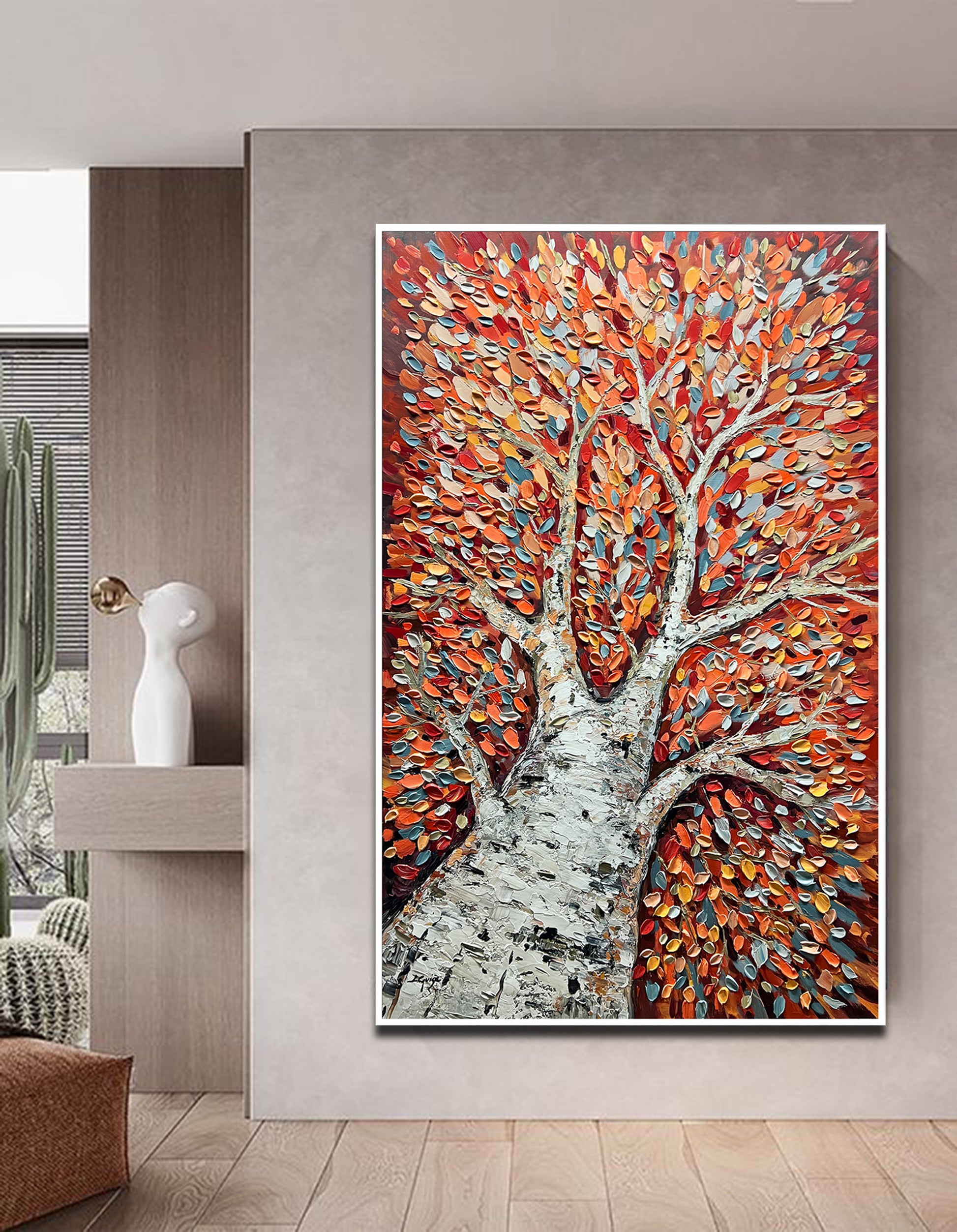 a painting of a tree in a living room