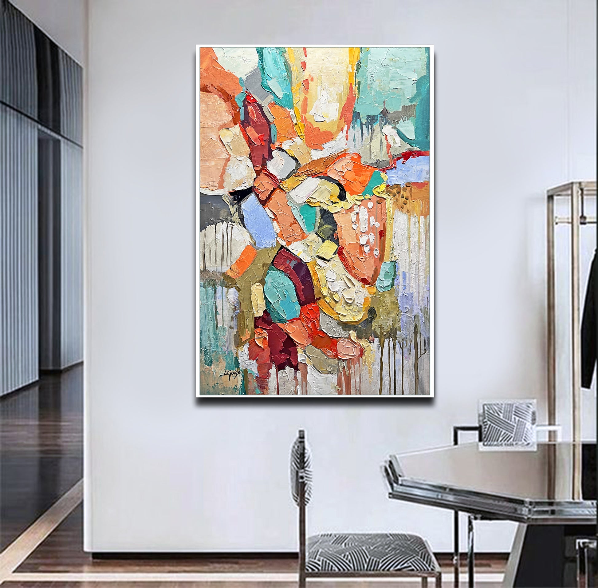 a painting hanging on a wall in a room