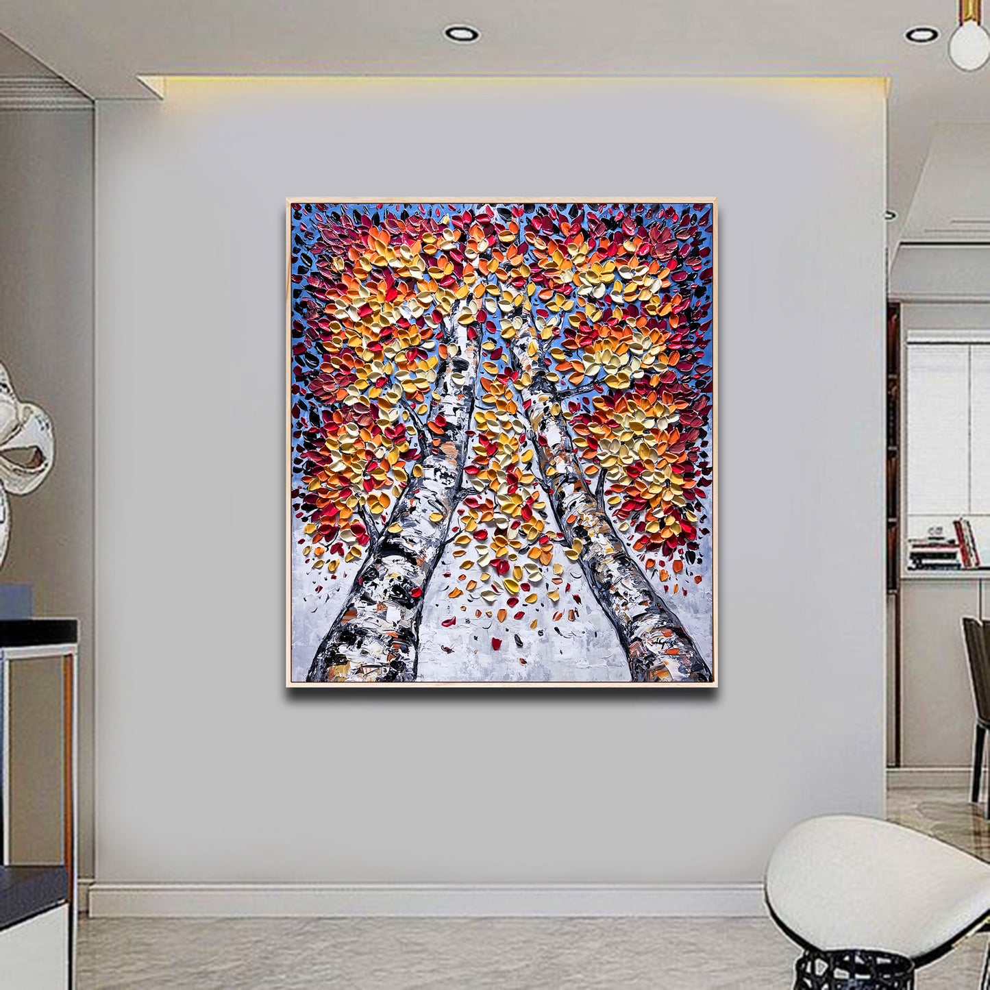 a painting hanging on the wall of a living room