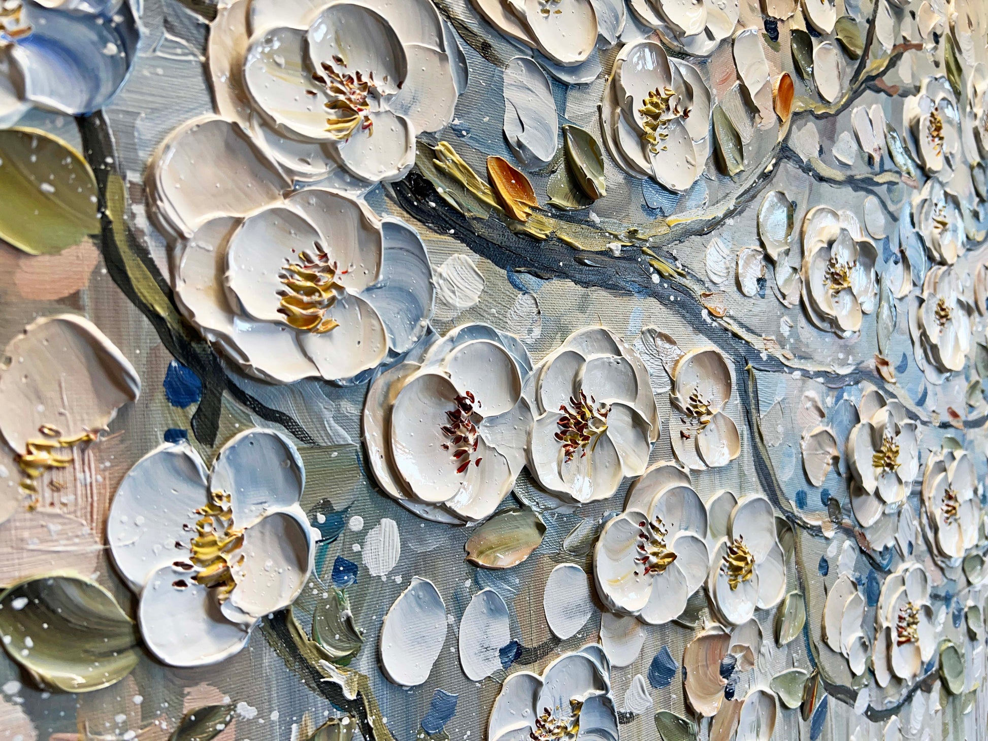 a close up of a wall with flowers on it