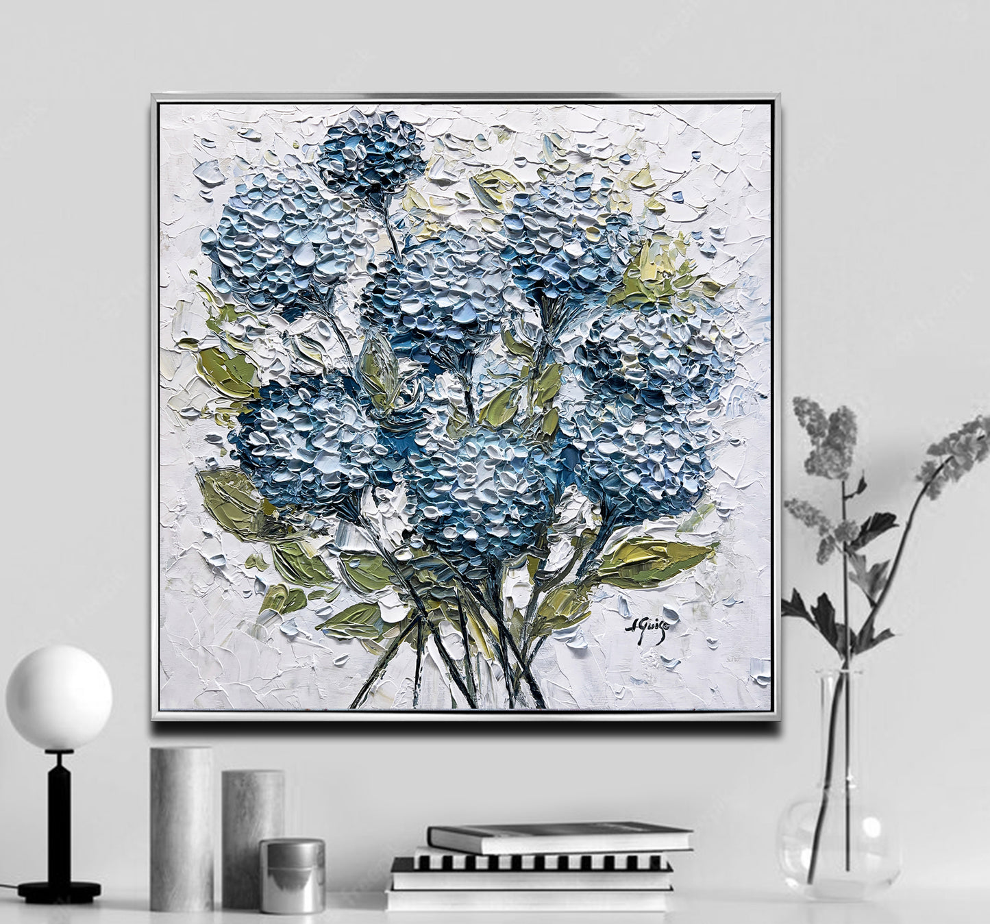 a painting of blue flowers on a white wall