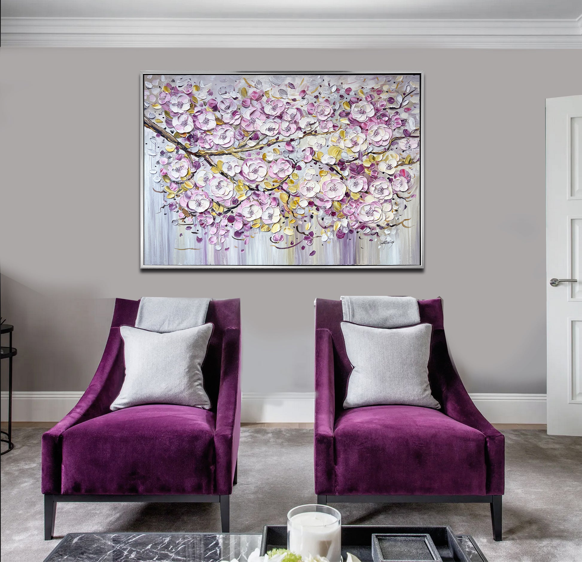 a living room with two purple chairs and a coffee table