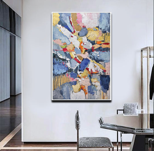 a painting hanging on a wall in a room