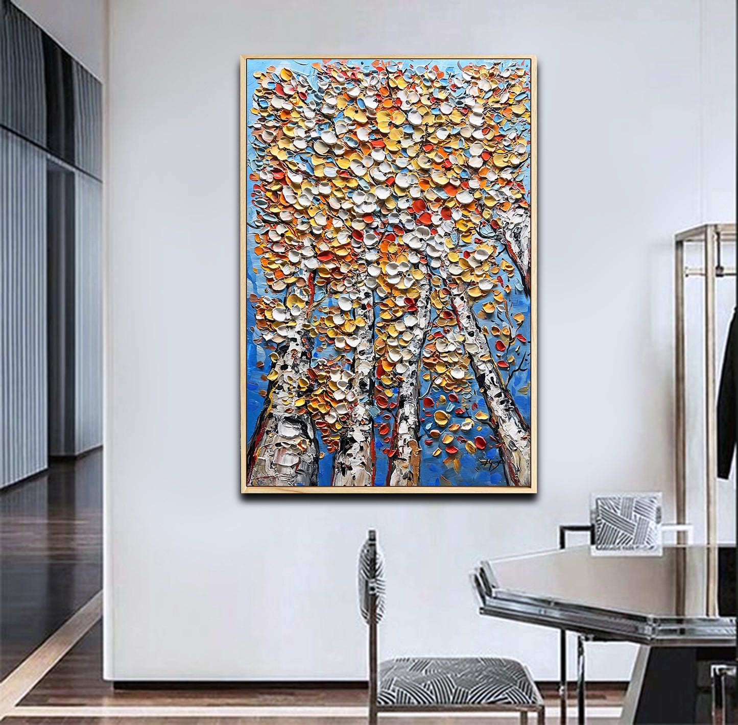 a painting hanging on a wall in a room