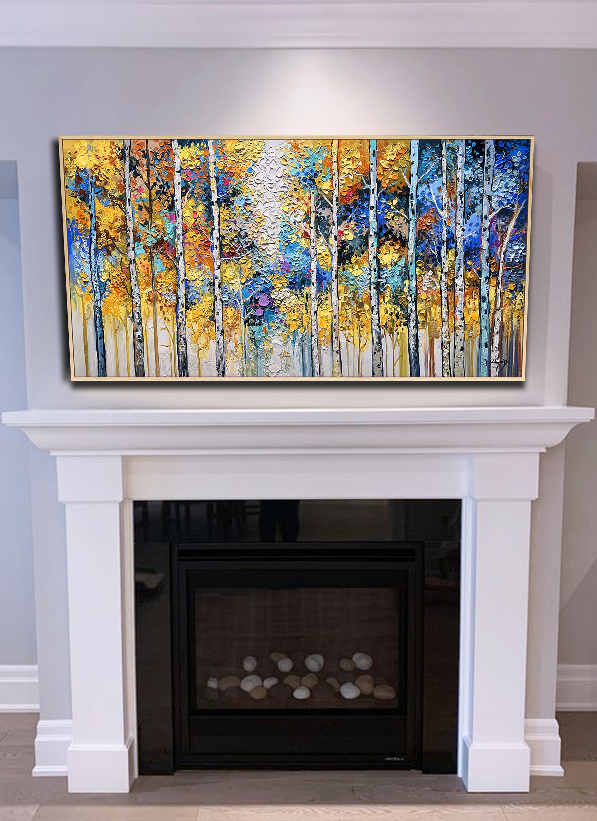 a fireplace with a painting on the mantle