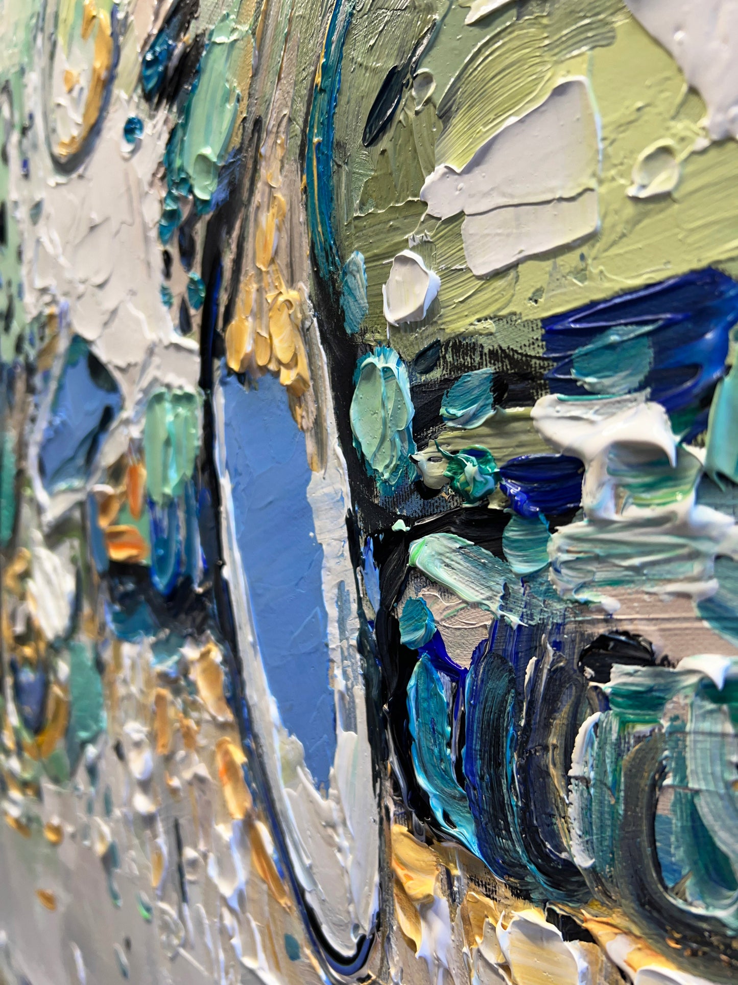 a close up of a painting with many different colors