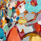 a close up of an abstract painting with many colors