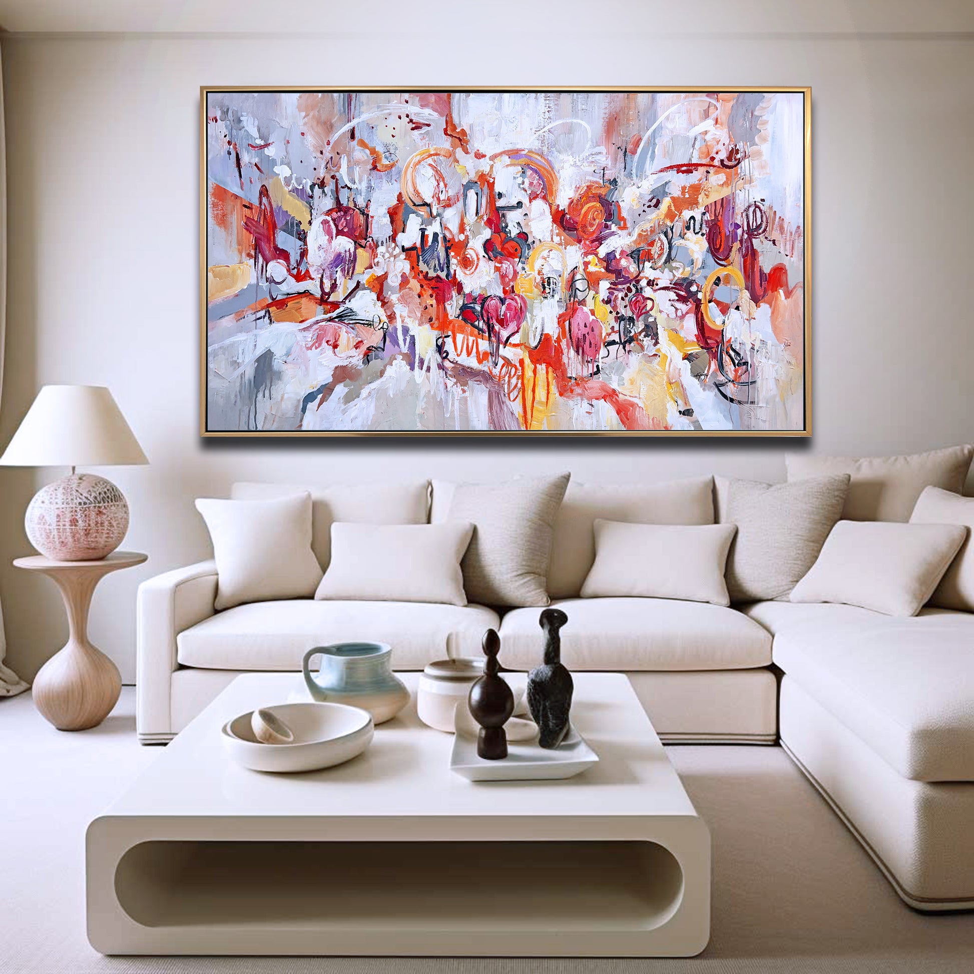 a living room with a large painting on the wall